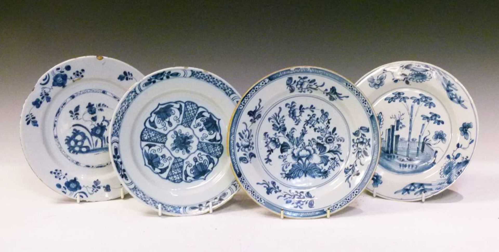 Four 18th Century English delft plates