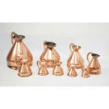 Set of copper jugs