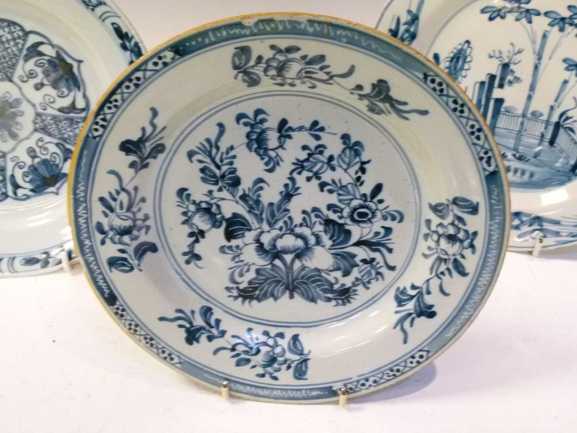 Four 18th Century English delft plates - Image 6 of 19