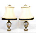 Pair of early 20th Century porcelain lamps