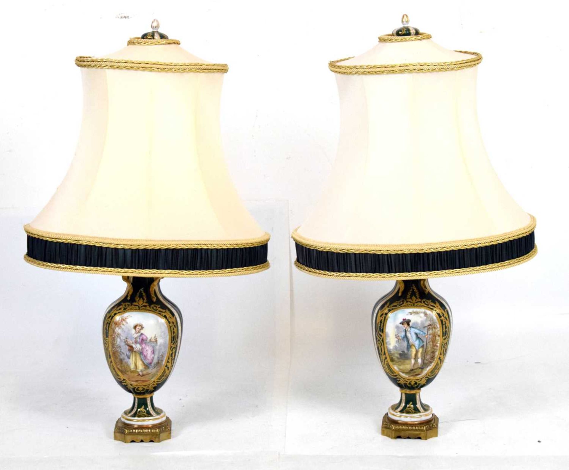 Pair of early 20th Century porcelain lamps