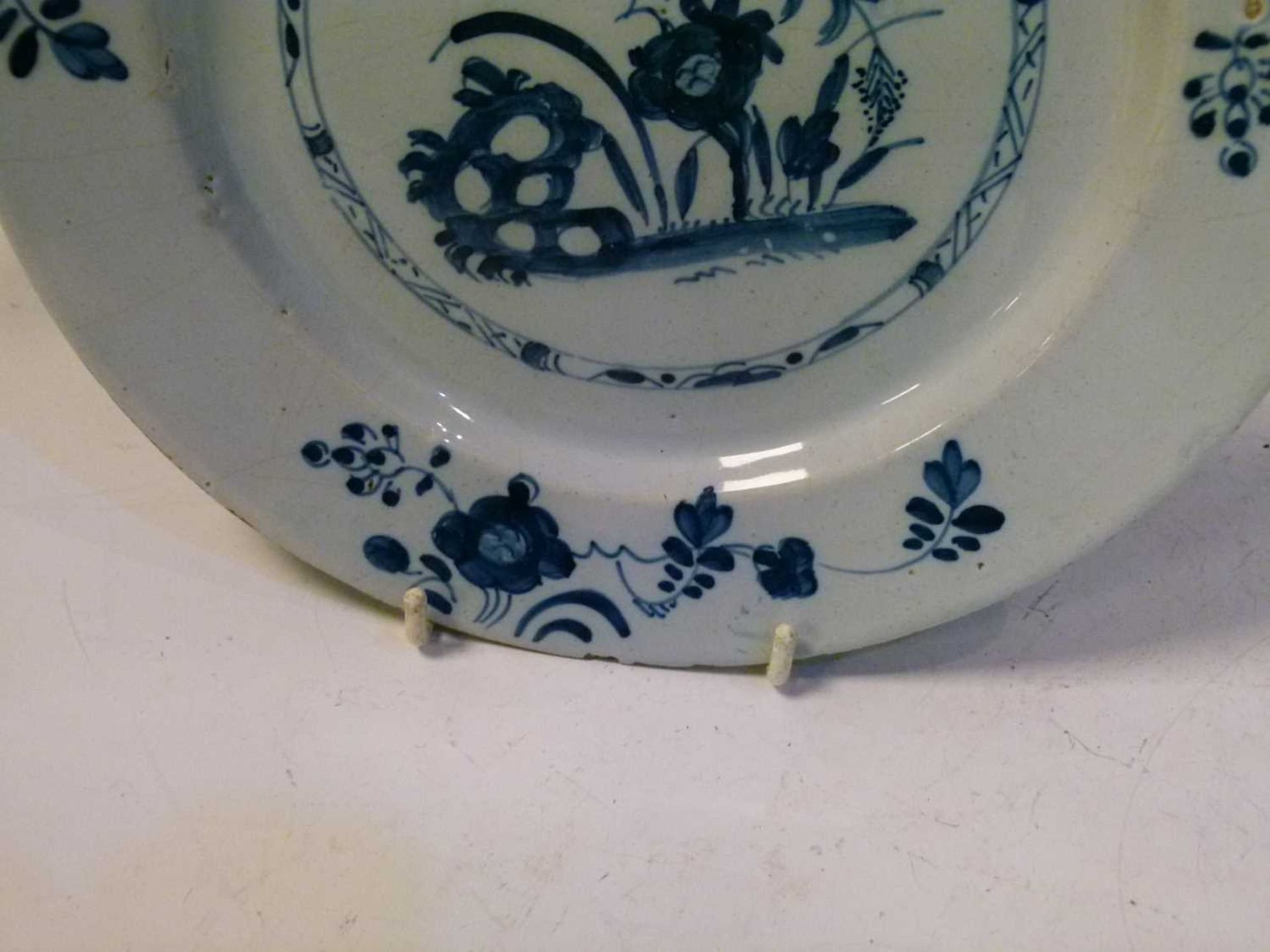 Four 18th Century English delft plates - Image 13 of 19