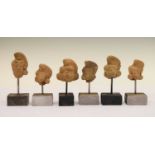 Six Pre Columbian terracotta heads