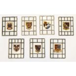 Seven early 20th Century stained glass window panels
