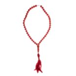 Row of coral worry beads