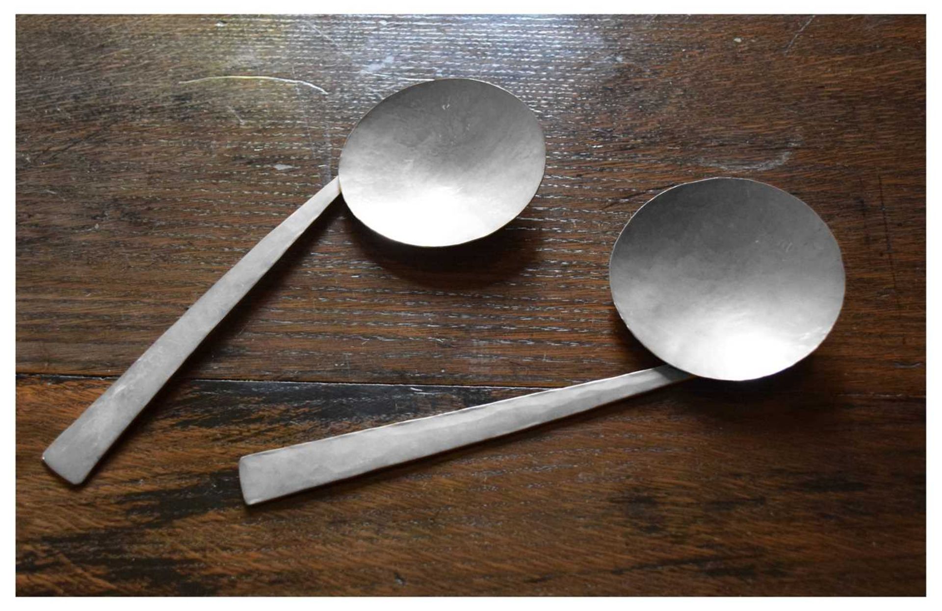 Pair of Elizabeth II Modernist silver spoons by Philippa Jane Merriman