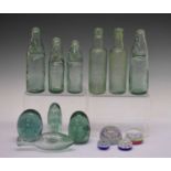 Group of 'Dump' and other paperweights and bottles