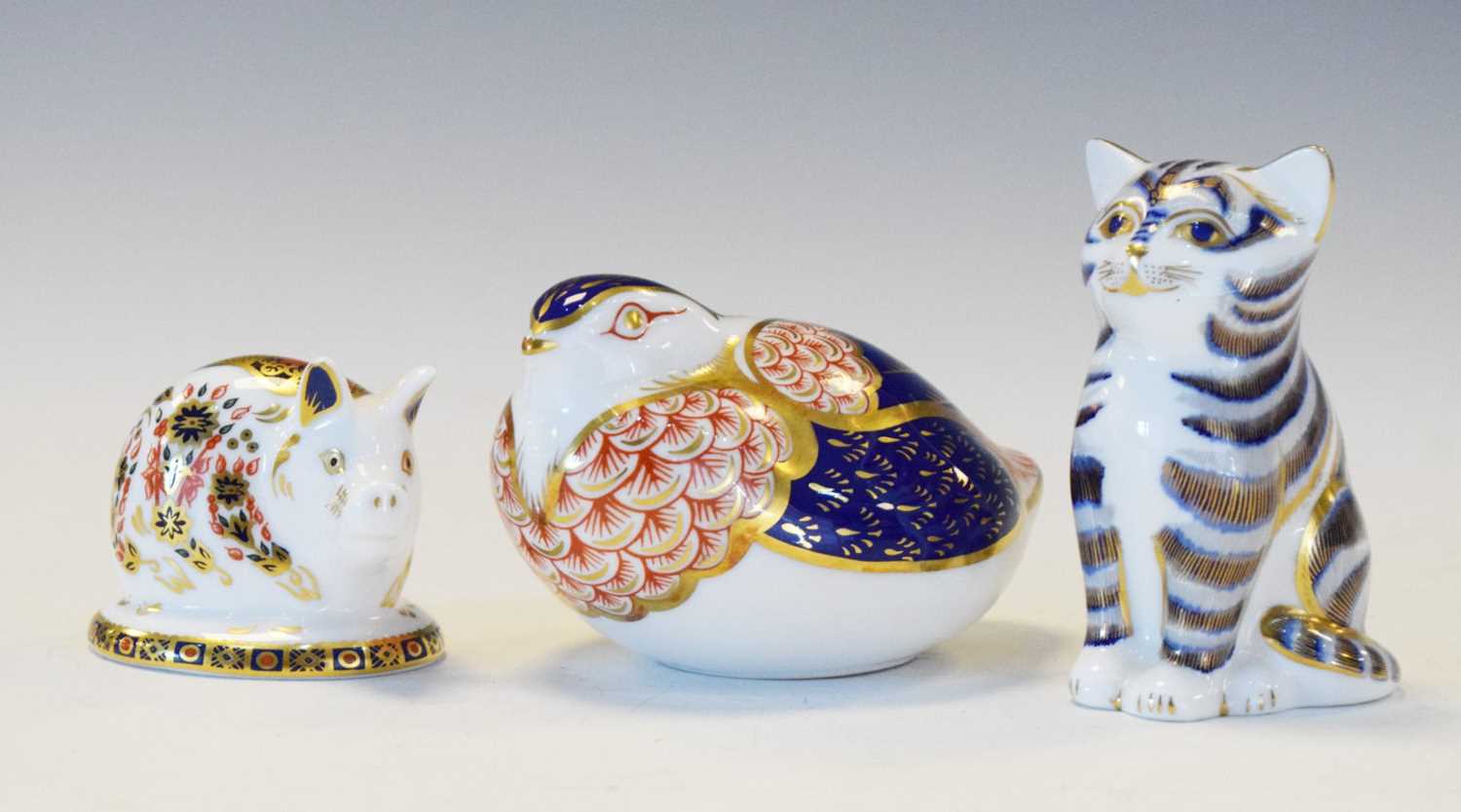 Royal Crown Derby - Three animal paperweights,