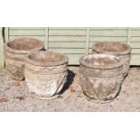 Set of four composite stone garden planters