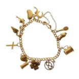 Yellow metal bracelet with various charms attached