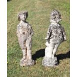Two composite stone garden statues