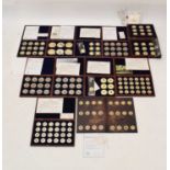 Eleven sets of gold-plated coin collections, etc