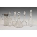 Five various decanters and a mounted jug