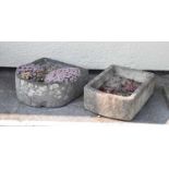 Two composite stone troughs