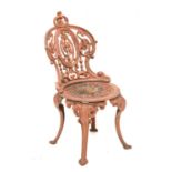 Late 19th Century cast iron garden chair/seat with pierced foliate decoration