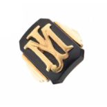 Yellow metal and onyx signet ring