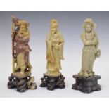 Three carved soapstone figures