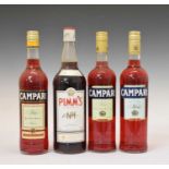 Three bottles of Campari and a 1 litre bottle of Pimm's No1 Cup
