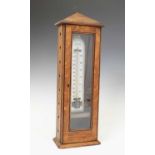 Oak cased Husbands Opticians Bristol thermometer