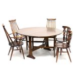 Ercol drop-leaf dark elm table and chairs
