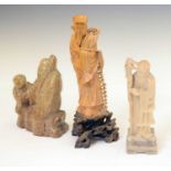 Three carved soapstone figures