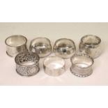 Pair of George VI silver napkin rings together with five other silver napkin rings