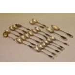 Assorted silver Fiddle pattern flatware to include two dessert spoons, teaspoons, etc