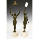Two Art Deco-style spelter figural lamps in the form of nude dancers