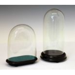 Two glass domes with stand