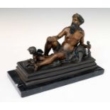 Reproduction bronze figure of a river god beside a cherub signed 'T.Carrier'