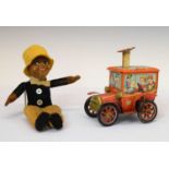 Norah Wellings doll and Japanese tin-plate circus car