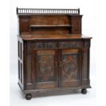 Late Victorian carved oak chiffonier