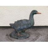 Composite stone garden ornament of a duck