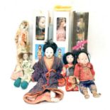 Collection of composition head Asian-style dolls