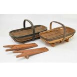 Two vintage trugs and a pair of boot jacks