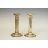 Pair of George V silver columnular candlesticks