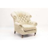 Button-back armchair upholstered in William Morris fabric
