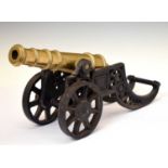 Large cast metal and brass cannon