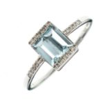 9ct white gold, blue topaz and diamond dress ring