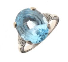 Blue topaz and diamond ring