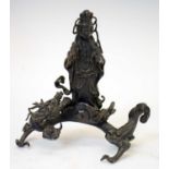 Bronze figure of Guanyin standing upon a dragon