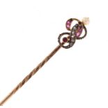 A diamond, pearl and stone set stick pin