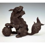Chinese bronze Dog of Fo with puzzle ball
