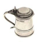 George VI miniature silver tankard with hinged lid and scroll handle