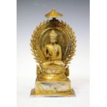 Silvered Buddha with mandorla