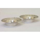 Pair of Indian white-metal circular dishes or bowls