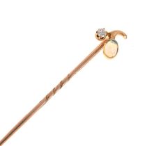 An opal and diamond set stick pin