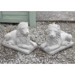 Pair of composite gardens statues recumbent lions