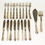 George V set of silver-handled cutlery and fish servers