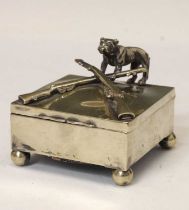 Early 20th century silver plated box with hinged lid decorated with rifles and bulldog